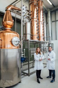 Fiona and David Boyd-Armstrong unveil one of two new state-of-the-art new copper stills that have been installed at Rademon Estate Distillery in Crossgar, Co. Down as part of a major £2.5million redevelopment. The expansion of the distillery’s Still House will treble production capacity, enabling Rademon to grow production volumes as demand for its award-winning Shortcross Gin grows globally. It will also increase the Distillery’s brewing and distilling capacity with the continuing production of a new Single Malt Irish Whiskey. The completion of the significant expansion also includes the addition of a contemporary new Visitor Experience Centre; a stylish, multipurpose space comprising a bar, gift shop and events space with stunning views across the estate.