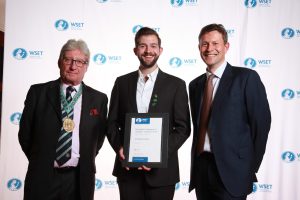 Timothy Powers receives his Distillers’ prize from Immediate Past Master Lorne Mackillop and Vocational Training and Education Committee chair Chris Pitcher